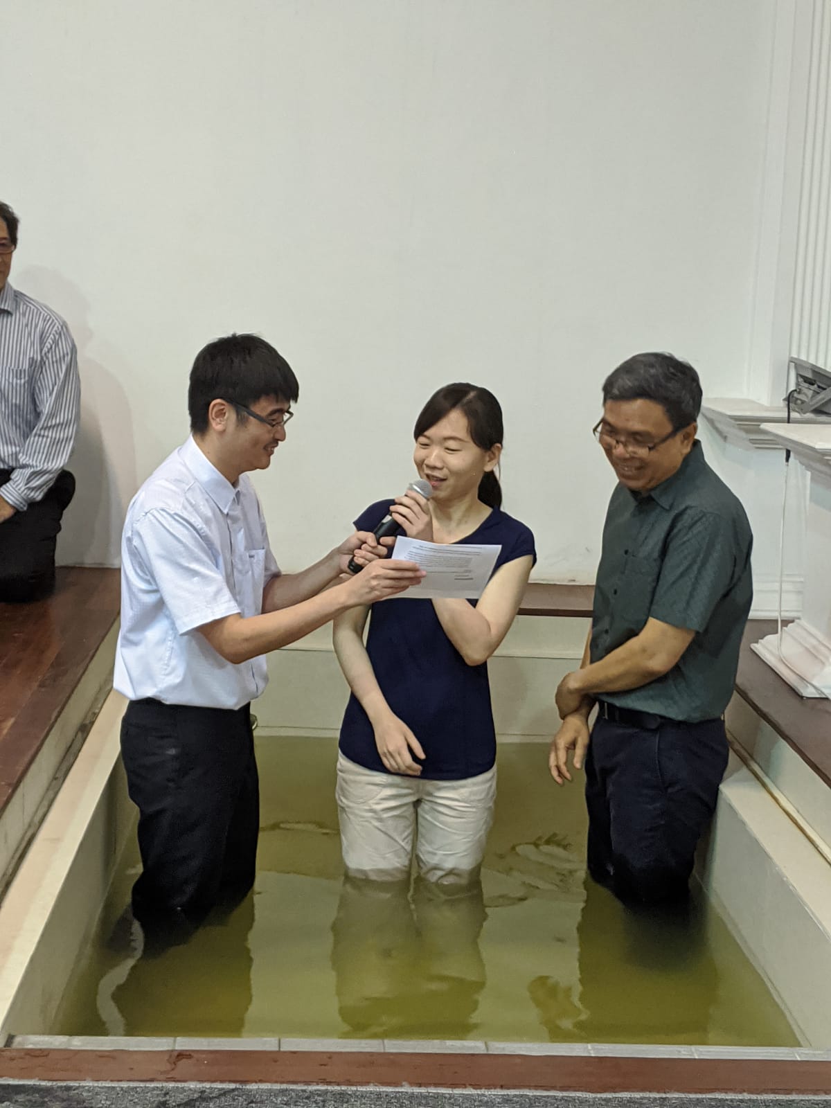 Irene being baptised